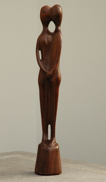 Leewens W.J.  | Twee figuren, hout 47,8 cm, gesigneerd onderop basis