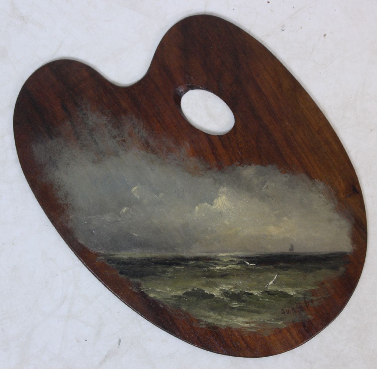 Laan G. van der | Gerard van der Laan | Schilderijen te koop aangeboden | De Noordzee, geschilderd op een schilderspalet, olieverf op paneel 28,2 x 20,8 cm, gesigneerd rechtsonder met initialen