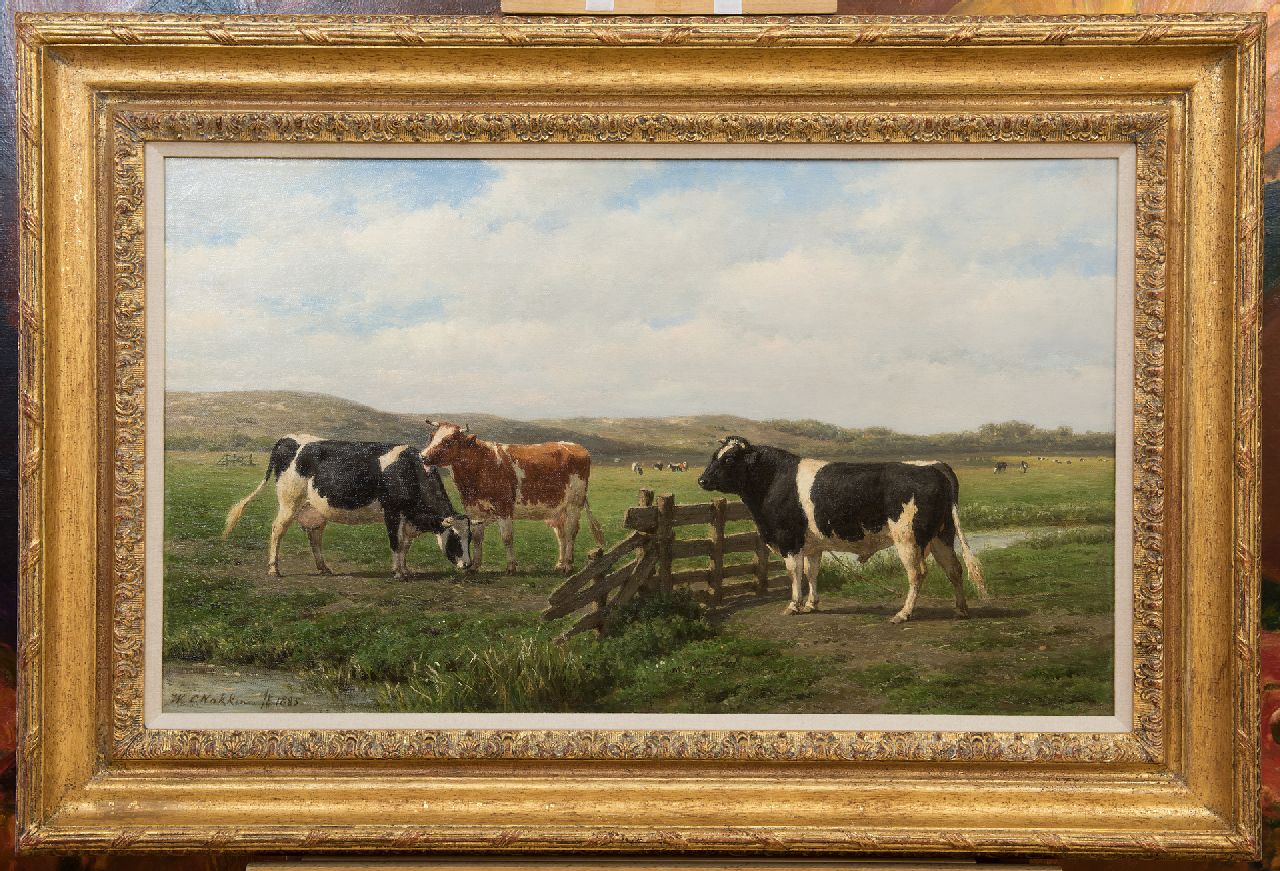 Nakken W.K.  | Willem Karel 'W.C.' Nakken, Koeien en stier bij een hek, olieverf op doek 42,4 x 72,5 cm, gesigneerd linksonder en gedateerd 1885